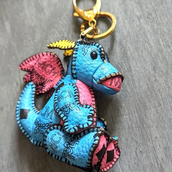 Adorable little MCM dragon in blue and pink, black logo, gold hardware - Picture 1 of 7